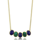 Stylish gold necklace for travel featuring blue and green decorative stones for a chic look