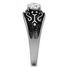 Stylish men's jewelry ring with a large diamond and intricate black detailing