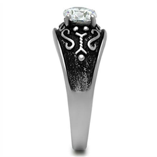 Stylish men's jewelry ring with a large diamond and intricate black detailing