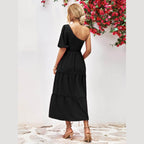 Trendsi stylish one-shoulder dress in black with tiered skirt and puff sleeve design