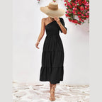 Trendsi stylish one-shoulder dress in black with a tiered design and a bow detail