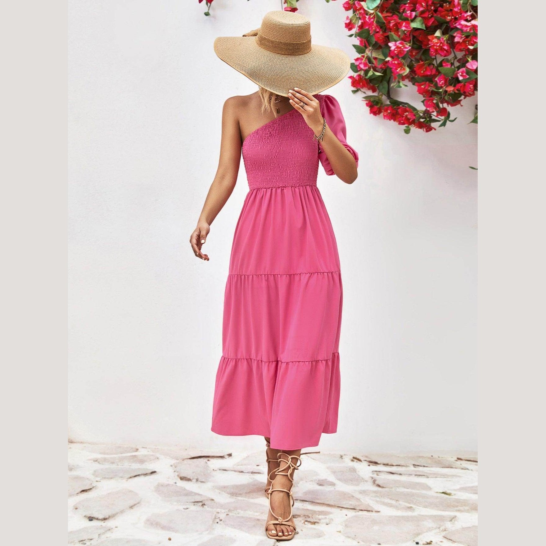 Trendsi stylish one-shoulder dress in vibrant pink with tiered design and a flowy silhouette