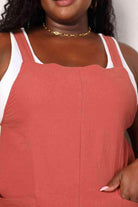 Trendsi stylish vacation overalls in coral color featuring a relaxed fit and adjustable straps