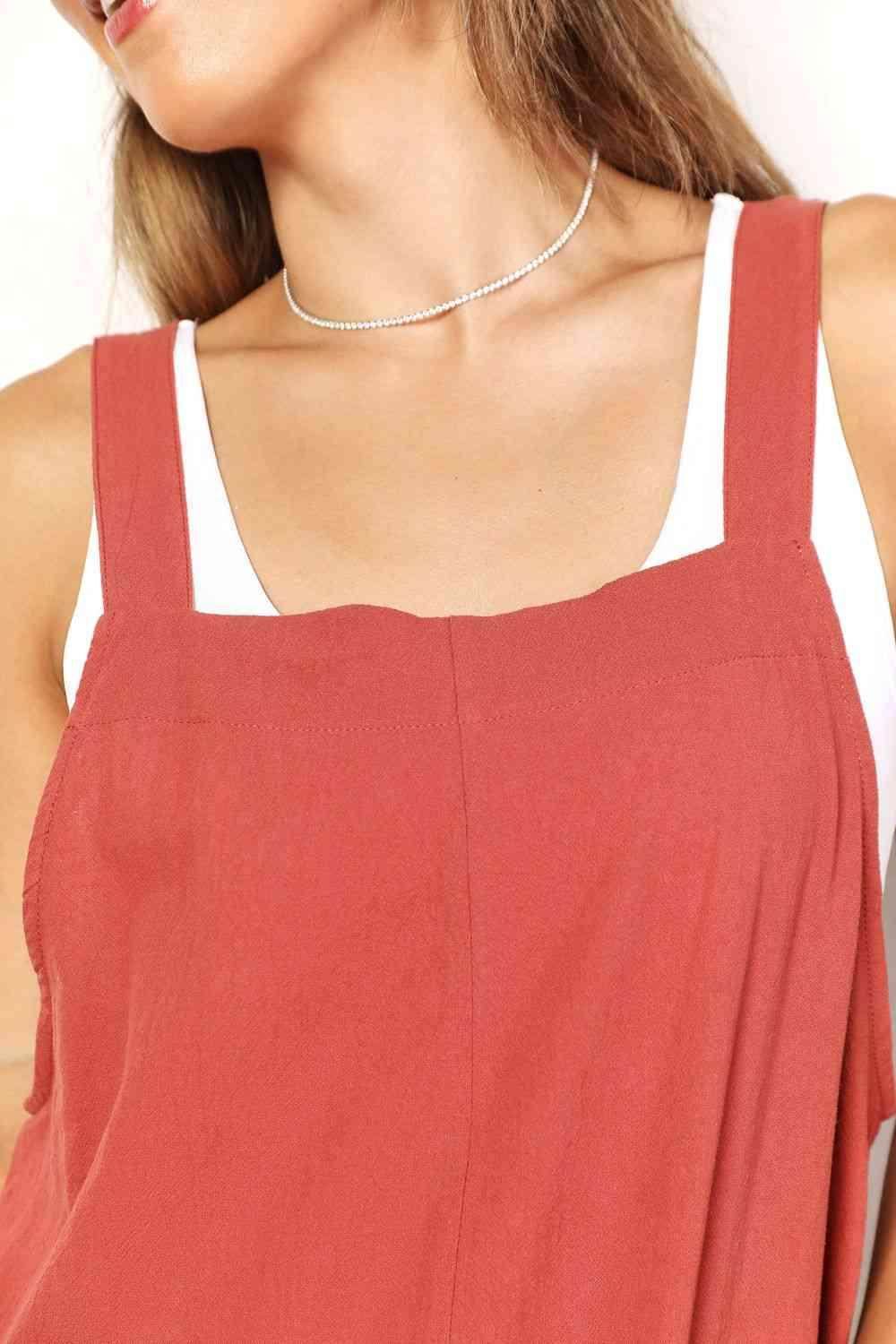 Trendsi stylish vacation overalls in coral with adjustable straps and a relaxed fit for summer outings