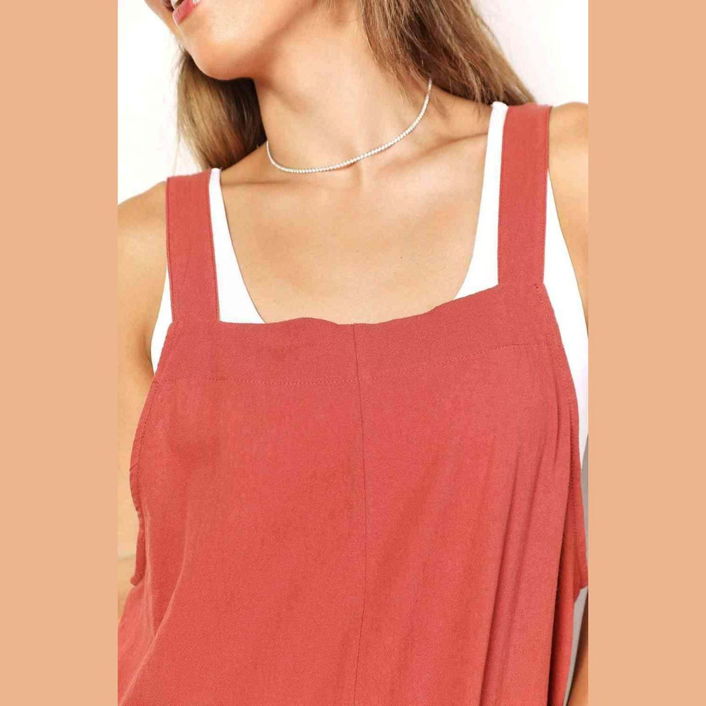 Trendsi stylish vacation overalls in coral with adjustable straps and a relaxed fit for summer outings