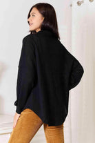 Trendsi stylish vacation sweater in black with a relaxed fit and soft knit fabric, perfect for travel.
