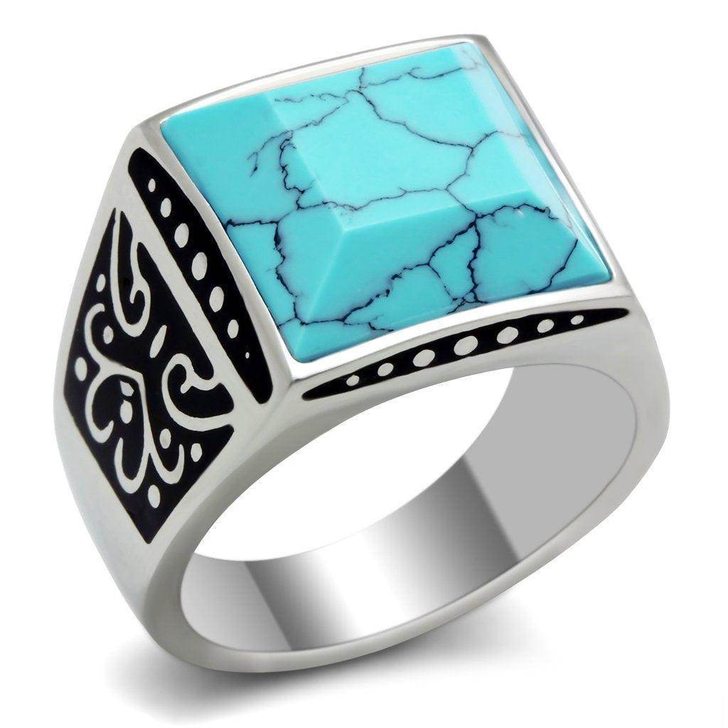 Men's synthetic turquoise jewelry ring with intricate black designs and a polished silver band
