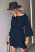 Trendsi tie neck vacation dress in navy blue with bell sleeves and a flattering fit