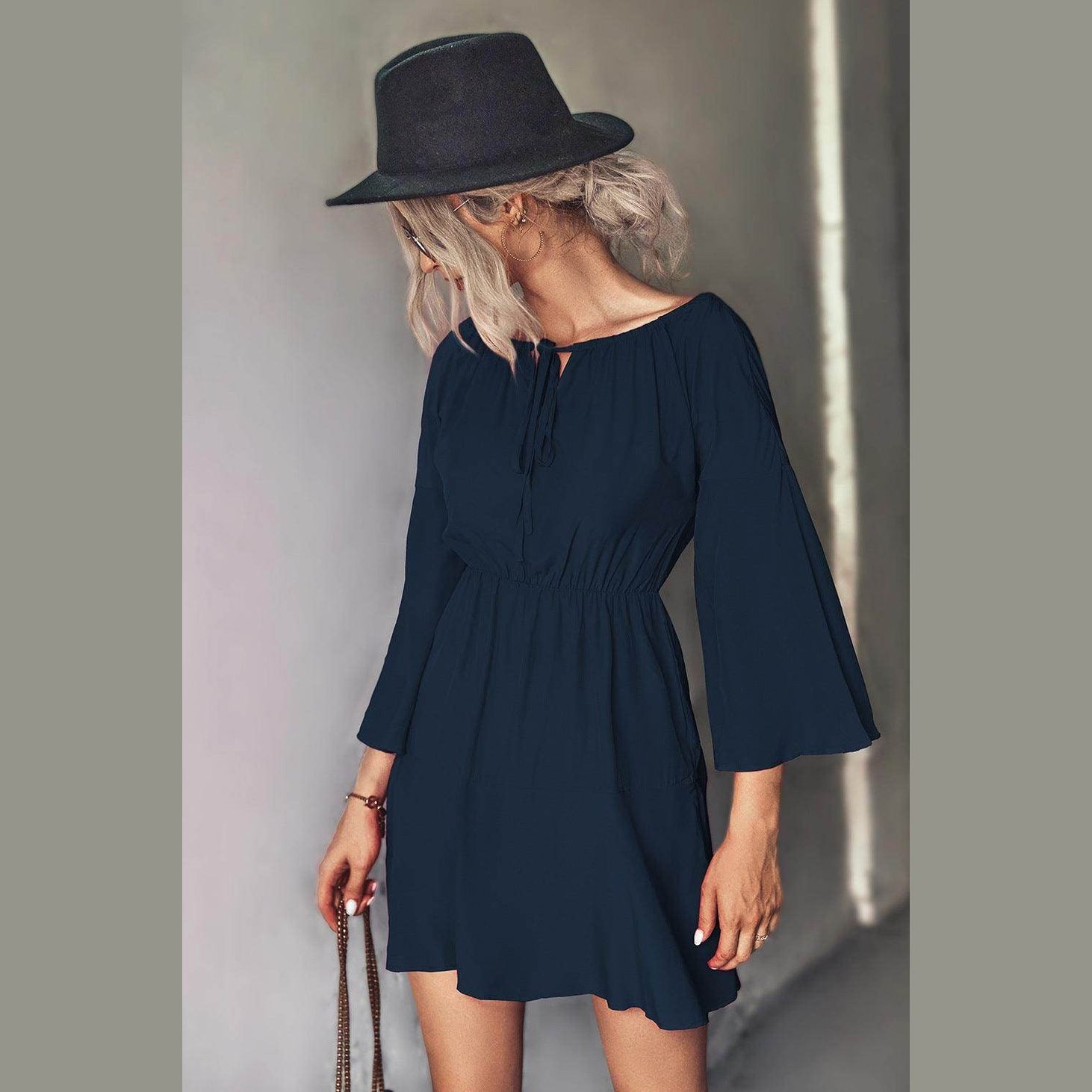 Trendsi tie neck vacation dress in navy blue with bell sleeves and a flattering fit