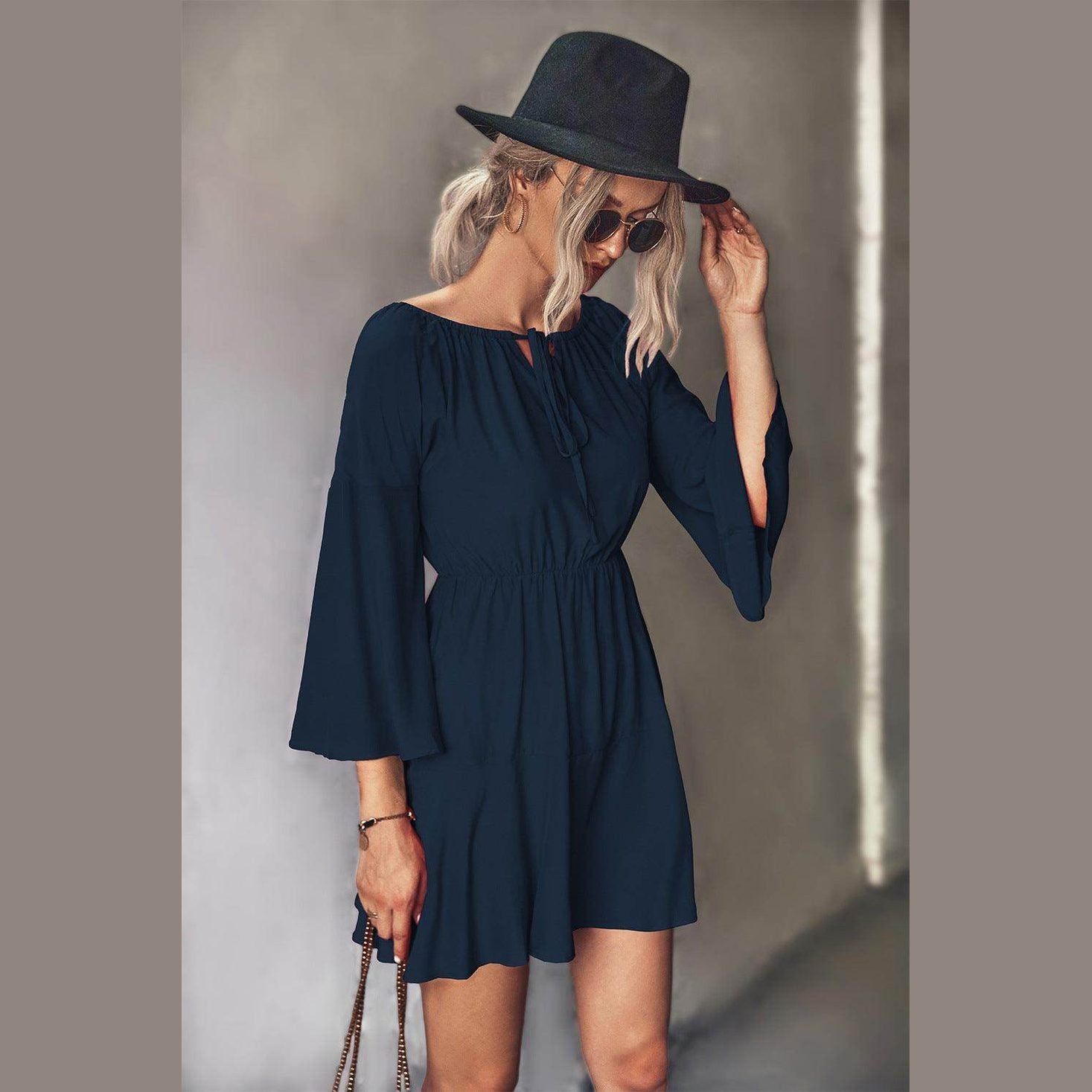 Trendsi tie neck vacation dress in navy with bell sleeves and a casual fit for summer outings