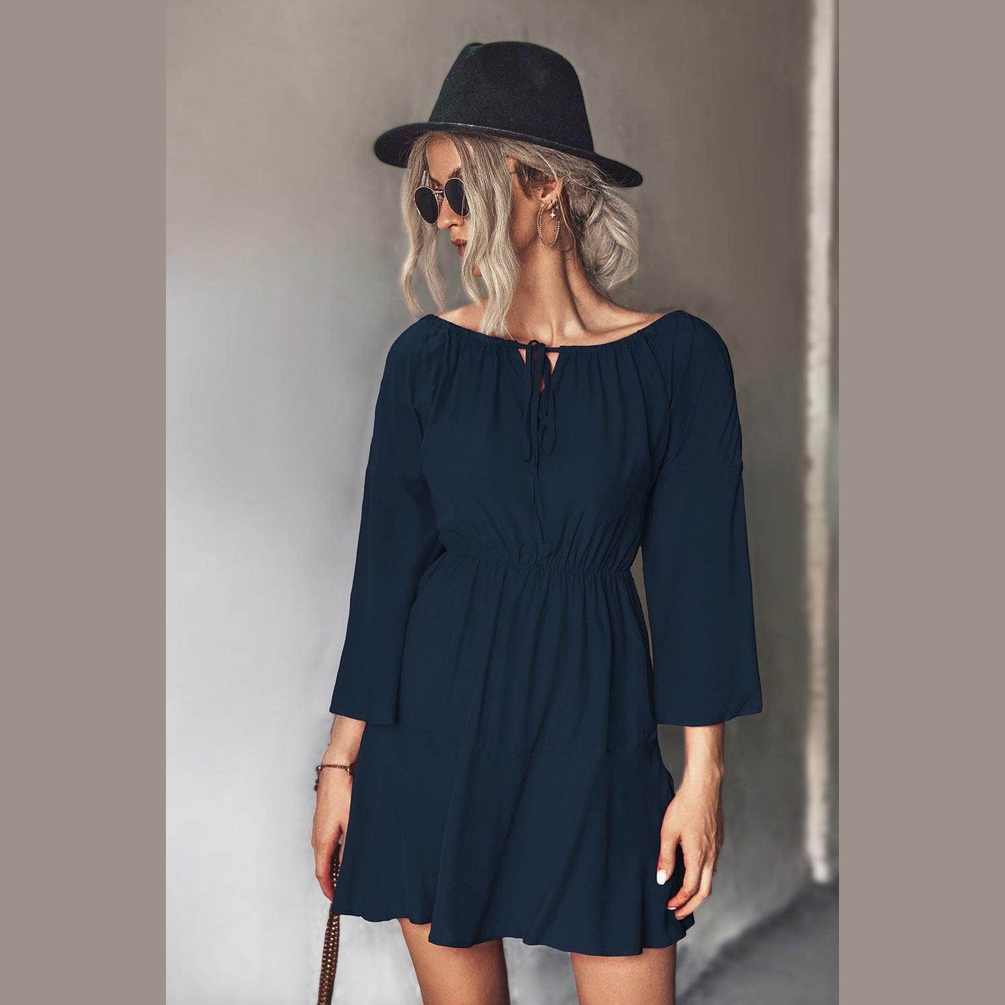 Trendsi tie neck vacation dress in navy with long sleeves and a relaxed fit for warm weather styling
