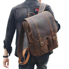 Stylish travel leather backpack with adjustable straps and multiple pockets for convenience