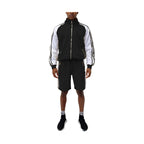Trendy mens summer outfit featuring a black and white 2PC track set with zip-up jacket and shorts