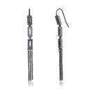 Trendy vacation jewelry for women, featuring elegant dangle earrings with blue stones and chain details