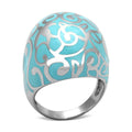 Turquoise inlay cocktail ring with intricate silver designs for stylish women
