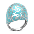 Turquoise inlay cocktail ring with intricate silver designs for stylish women