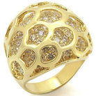 Unique gold statement ring with intricate design and sparkling stones for a bold look