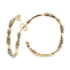 Unique gold textured earrings with intricate design and sparkling accents for elegant style