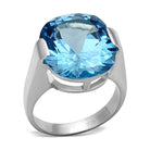 Unique silver cocktail ring featuring a large blue gemstone for elegant occasions