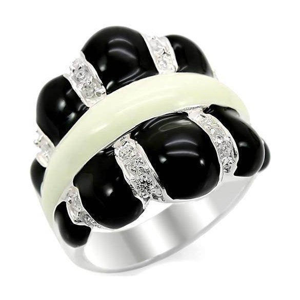 Unique sterling silver statement ring featuring black and white stones with intricate detailing