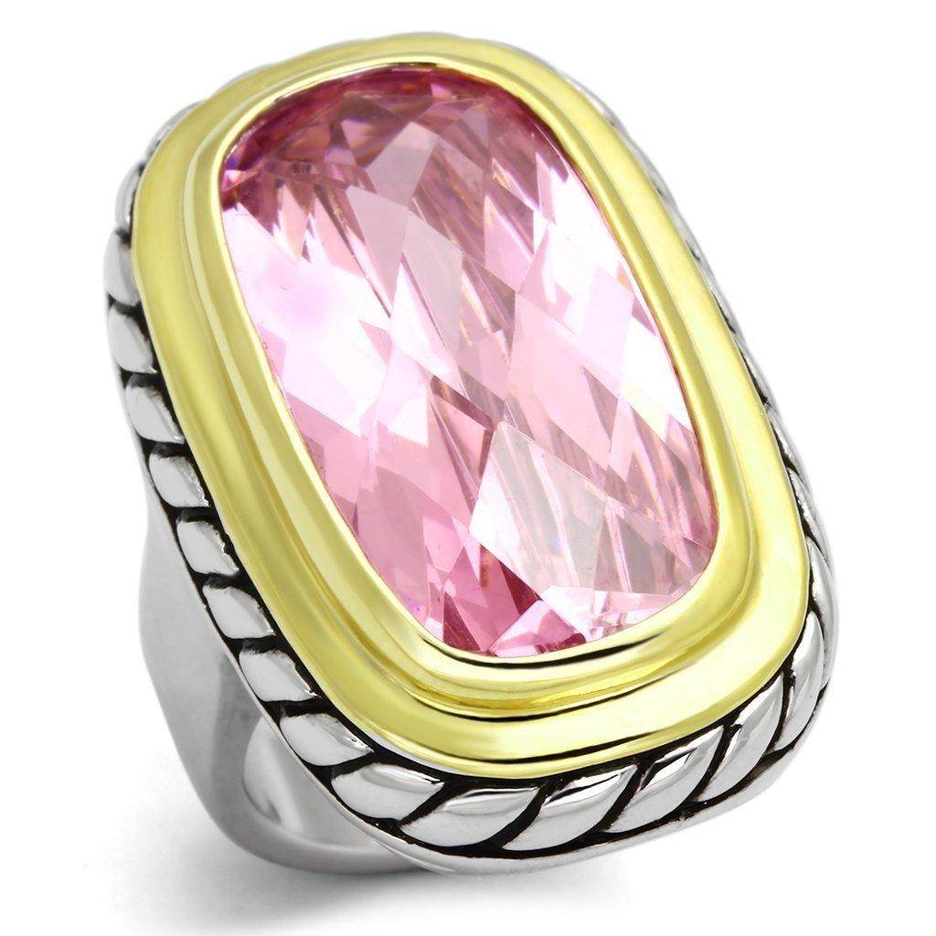 Unique vacation jewelry for her featuring a pink gemstone ring with silver and gold accents