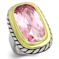 Unique vacation jewelry for her featuring a pink gemstone ring with silver and gold accents