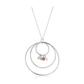 Unique vacation jewelry for her featuring a silver hoop necklace with colorful stone accents