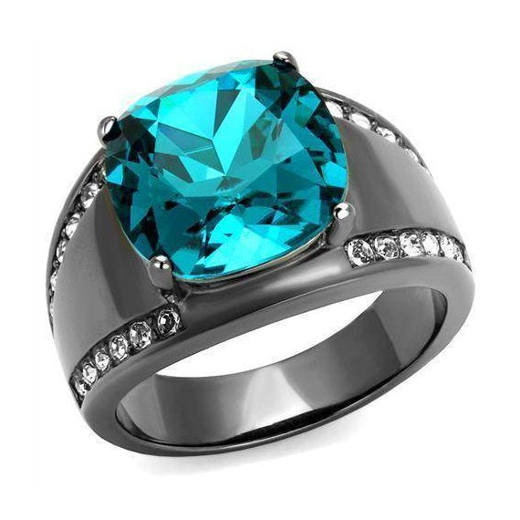 Stunning black ring featuring a large turquoise stone, perfect for unique vacation jewelry for women