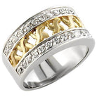 Unique vacation jewelry for women, featuring a stylish silver and gold ring with elegant detailing