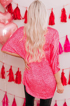Trendsi Women's Pink Leopard Print Shirt, perfect for vacation fashion tops