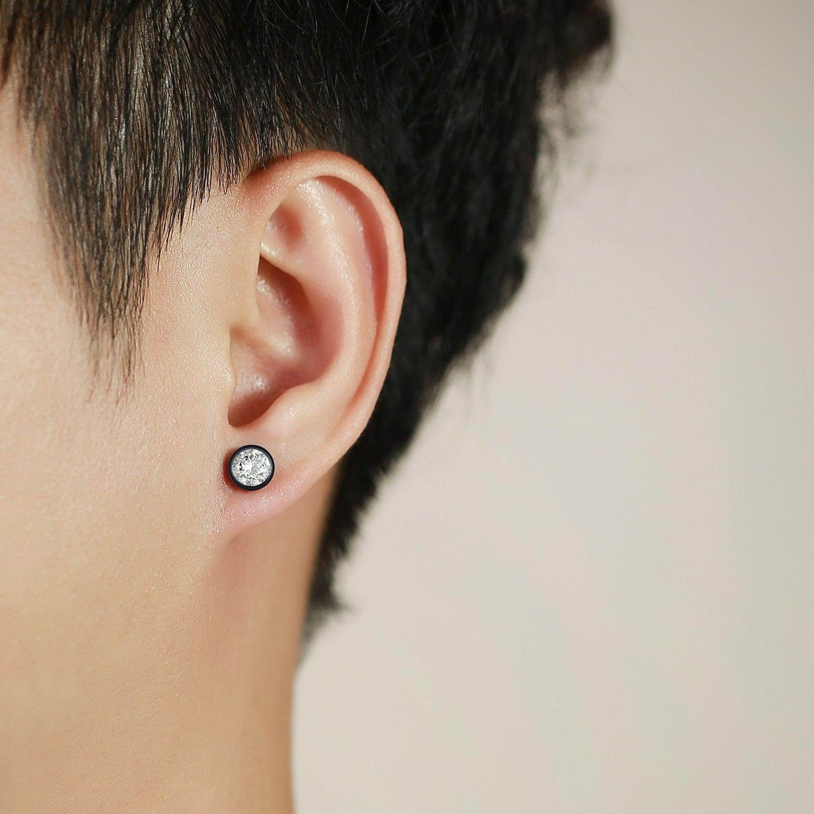 Stylish men's earrings featuring a round design, perfect vacation jewelry for men