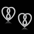 Elegant silver heart-shaped earrings with sparkling stones, perfect as vacation jewelry for women