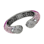 Stylish vacation jewelry for women featuring a sparkling bangle with pink and clear crystals