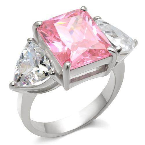 Stylish women's ring featuring a pink center stone and clear accents, perfect vacation jewelry for women.