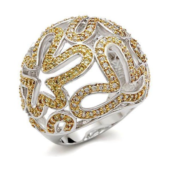 Elegant silver and gold women's ring featuring intricate design, perfect vacation jewelry for women