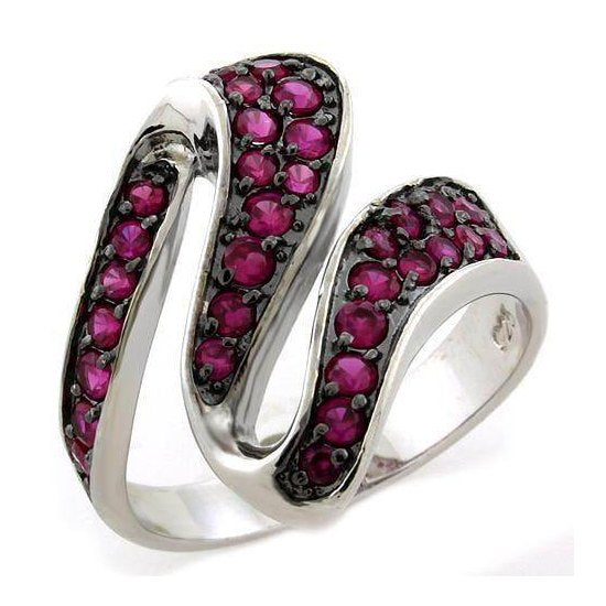 Stunning women's ring featuring twisted design with vibrant pink gemstones, perfect vacation jewelry for women