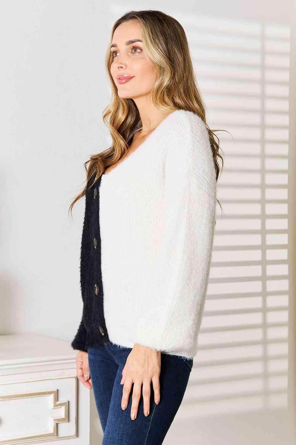 Stylish women's vacation style cardigan in black and white with chic button details
