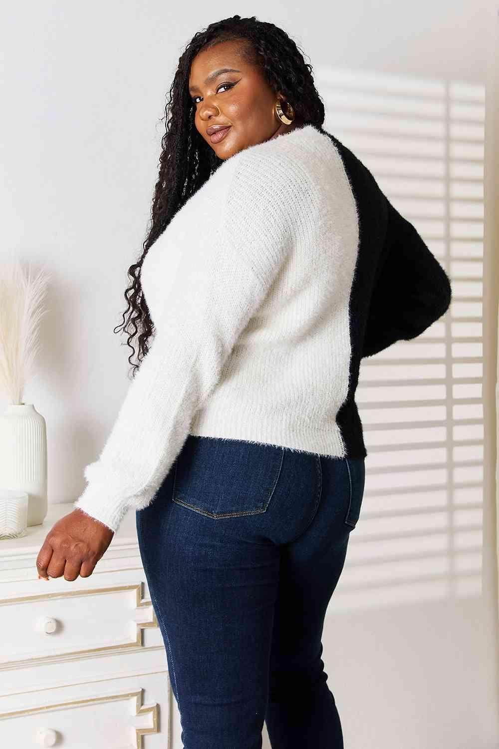 Trendsi women's vacation style cardigan in black and white, featuring a cozy design and relaxed fit.