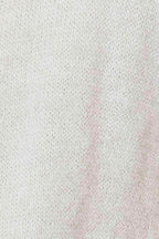 Lightweight vacation style cardigan in soft cream knit fabric for effortless layering