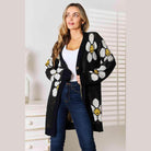 Trendsi vacation style floral cardigan in black with cheerful flower design for stylish layering