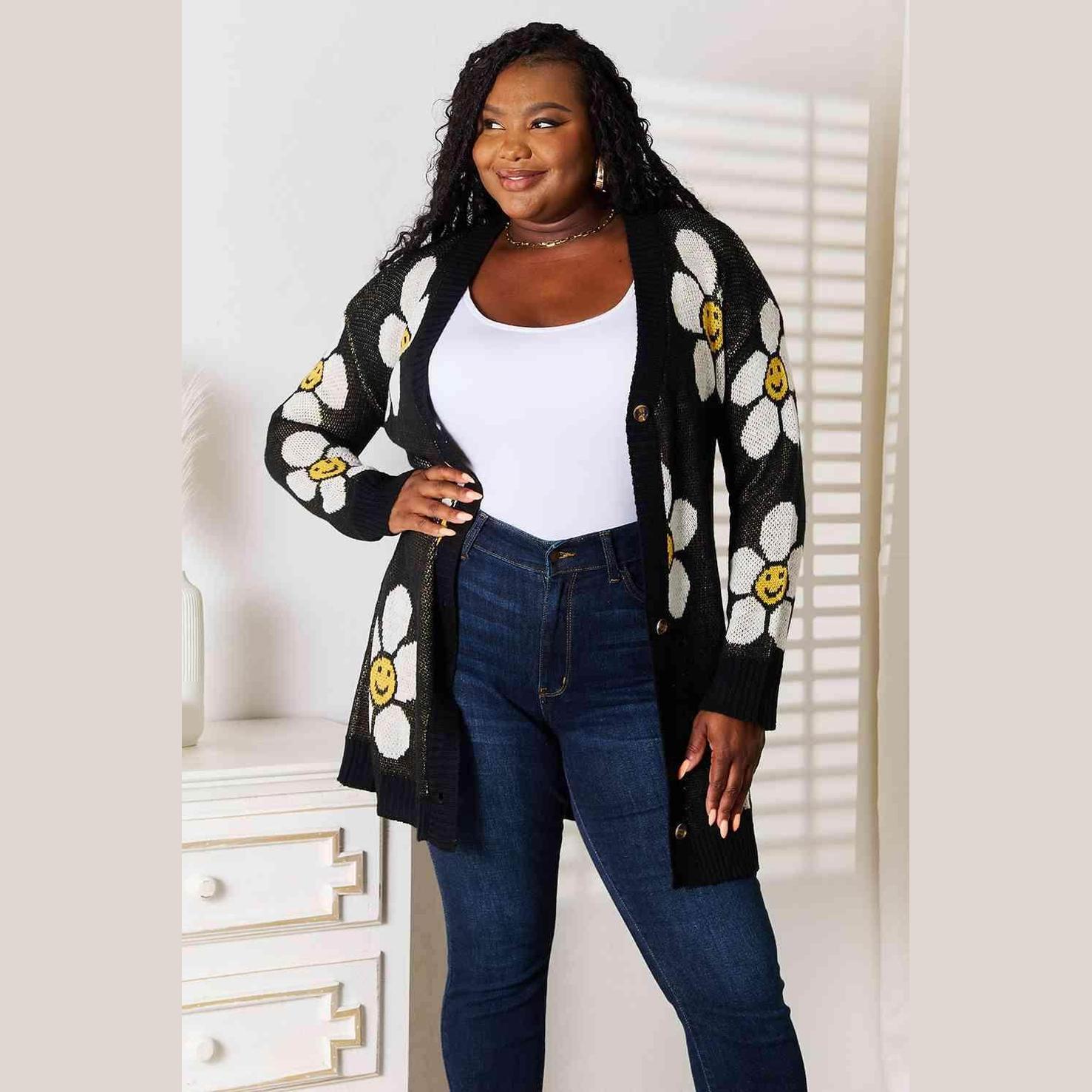 Trendsi vacation style floral cardigan featuring a black background with cheerful daisies and smiley faces