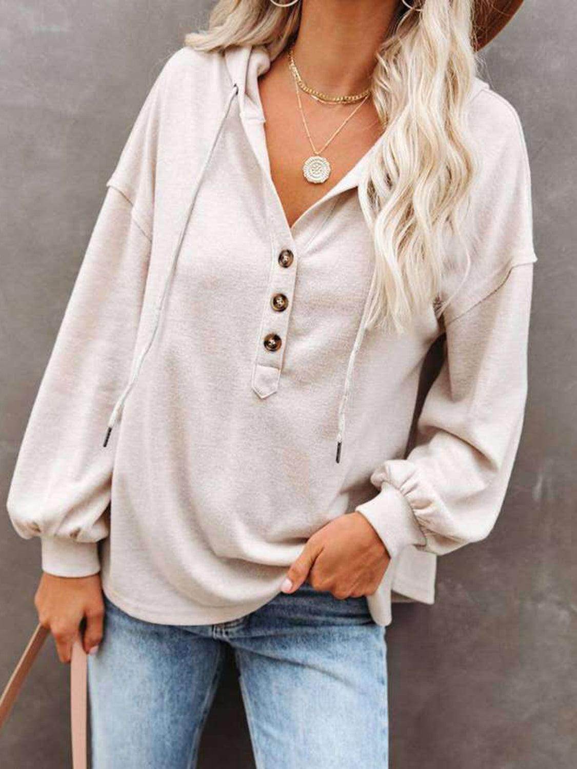 Trendsi women's vacation style hoodie with button details and relaxed fit for casual wear