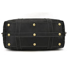 Vacation style leather bag with sturdy design and gold hardware for durable travel use