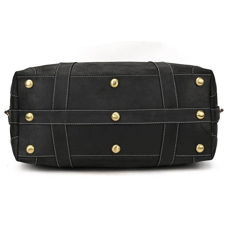 Vacation style leather bag with sturdy design and gold hardware for durable travel use