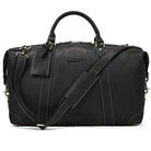 Vacation style leather bag with adjustable shoulder strap and sturdy handles in classic black