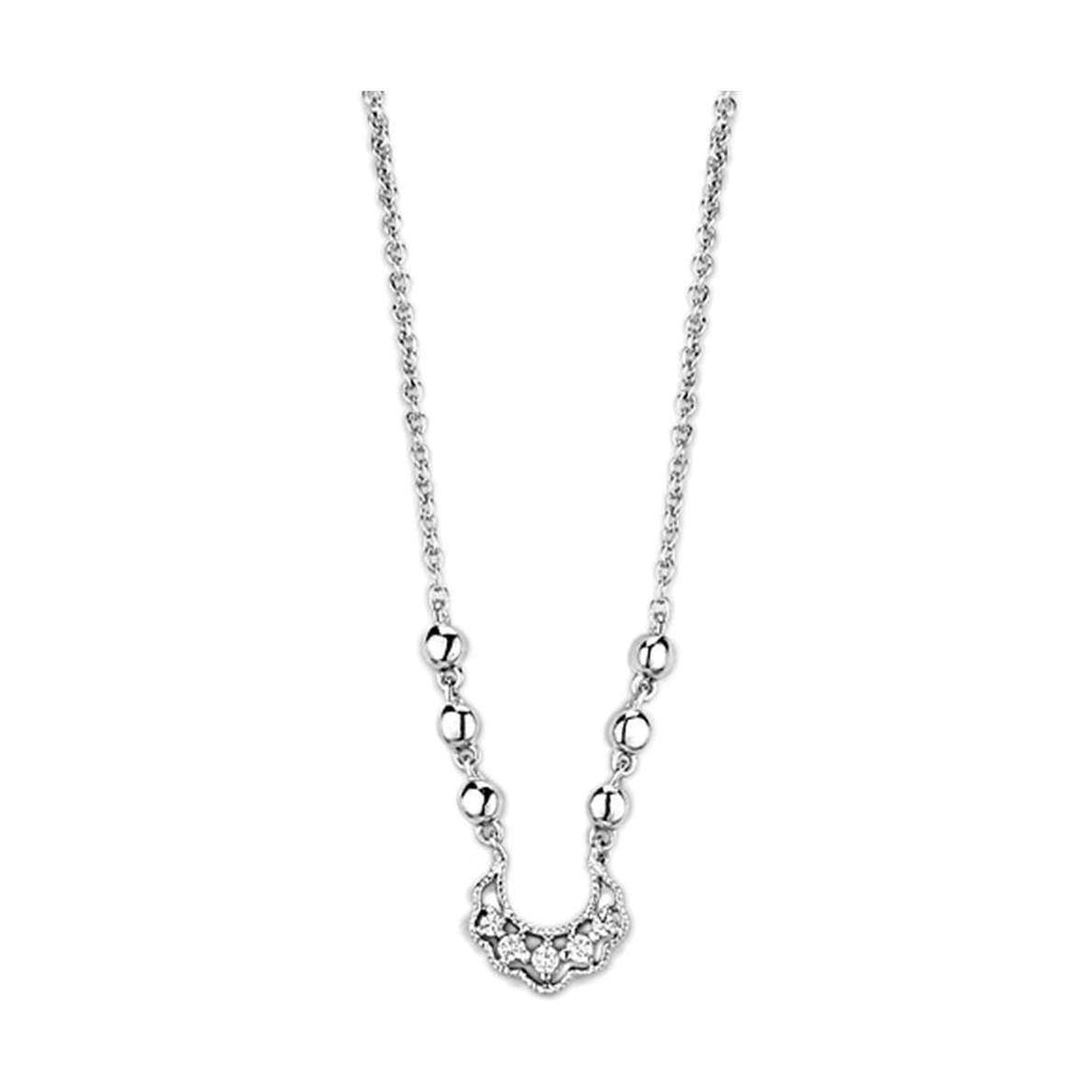 Vacation style silver necklace with intricate design, perfect for summer outfits and beach getaways