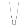 Vacation style silver necklace with intricate design, perfect for summer outfits and beach getaways