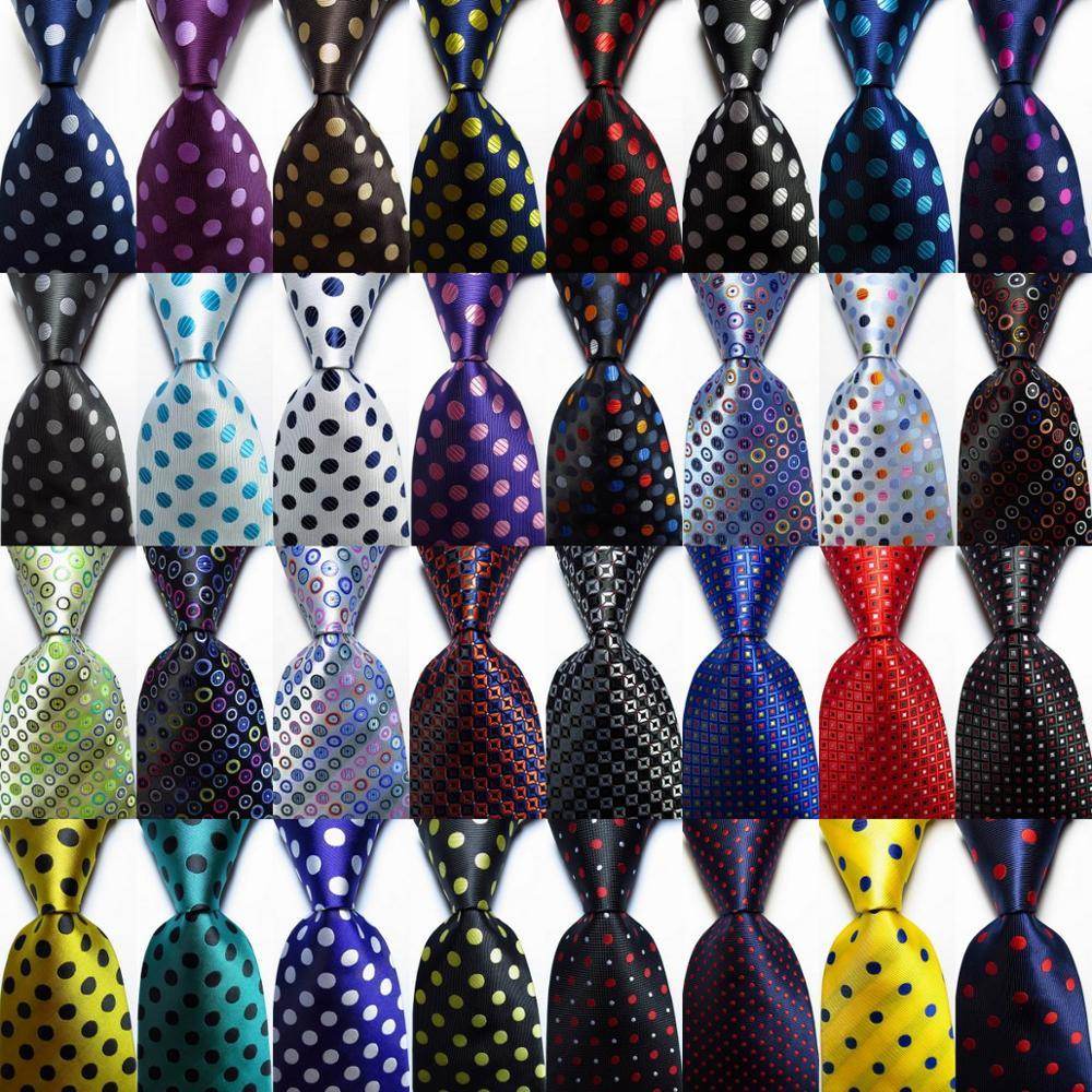 Colorful assorted men's ties featuring a gold green necktie set among various patterns