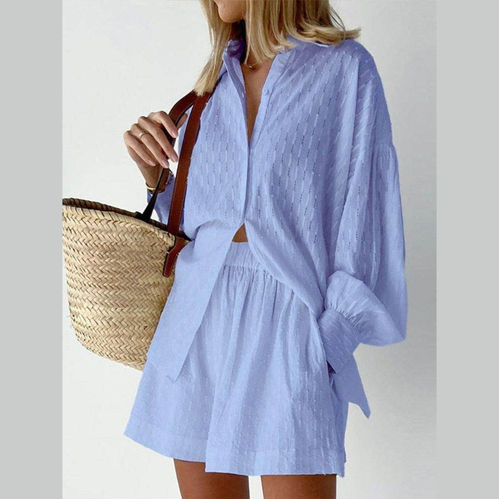 Light blue women's outfit featuring a lantern sleeve shirt and shorts, perfect for casual summer styling
