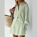 Light green women's outfit featuring a lantern sleeve shirt and shorts, perfect for summer styles